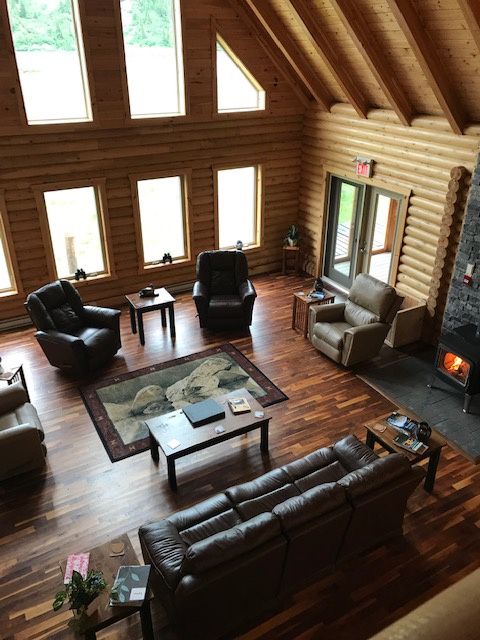 Enjoy the sound of a crackling fire while relaxing in one of the Sitting Rooms at Big River Lodge